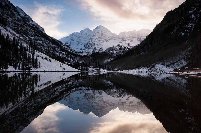 Maroon Bells Reflection in Maroon Lake in Winter, Maroon - Snowmass Wilderness, Colorado